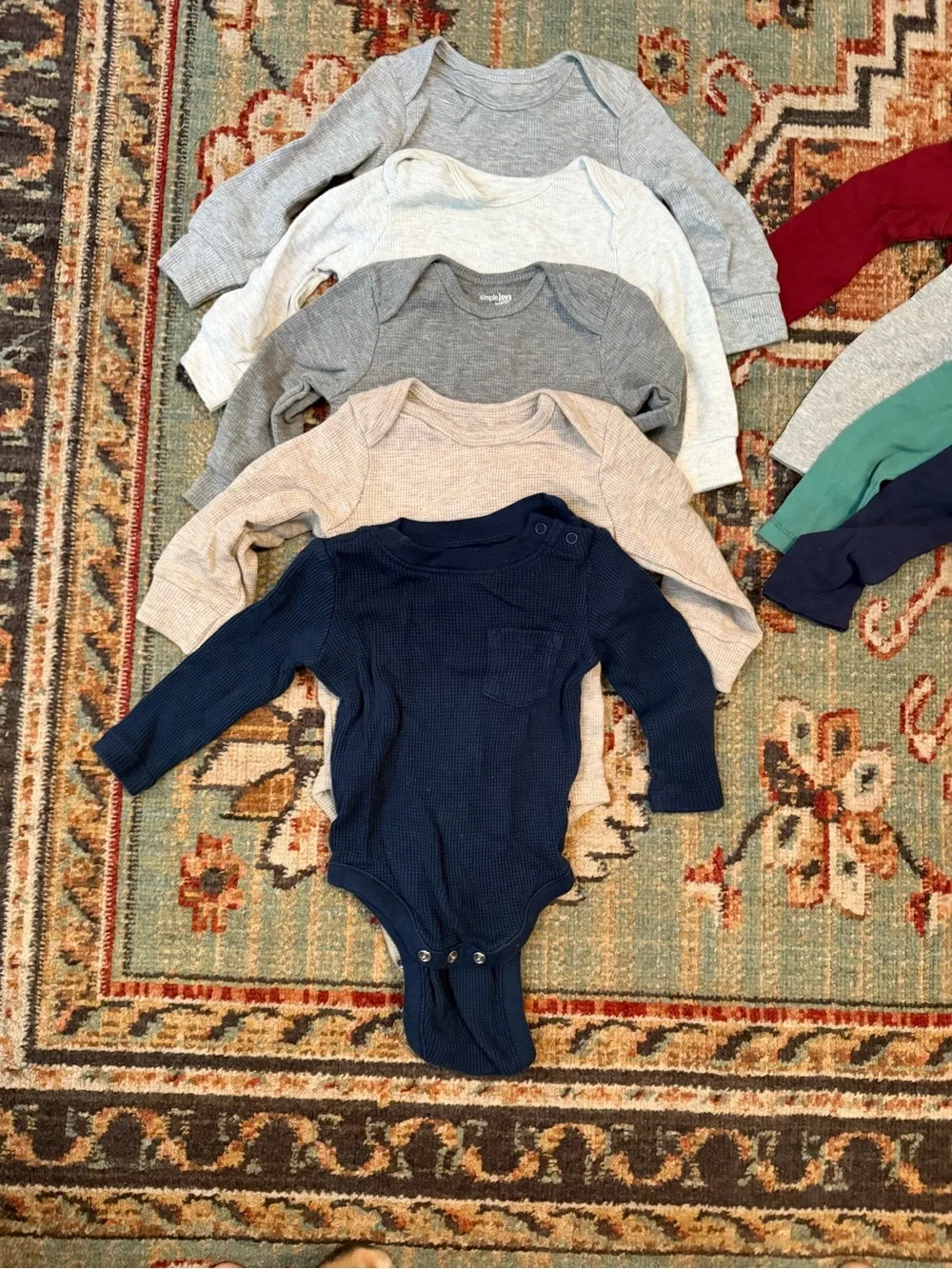 Carter's Long-Sleeve Baby Onesies in Navy, Red, Green, Gray, Cream, Beige